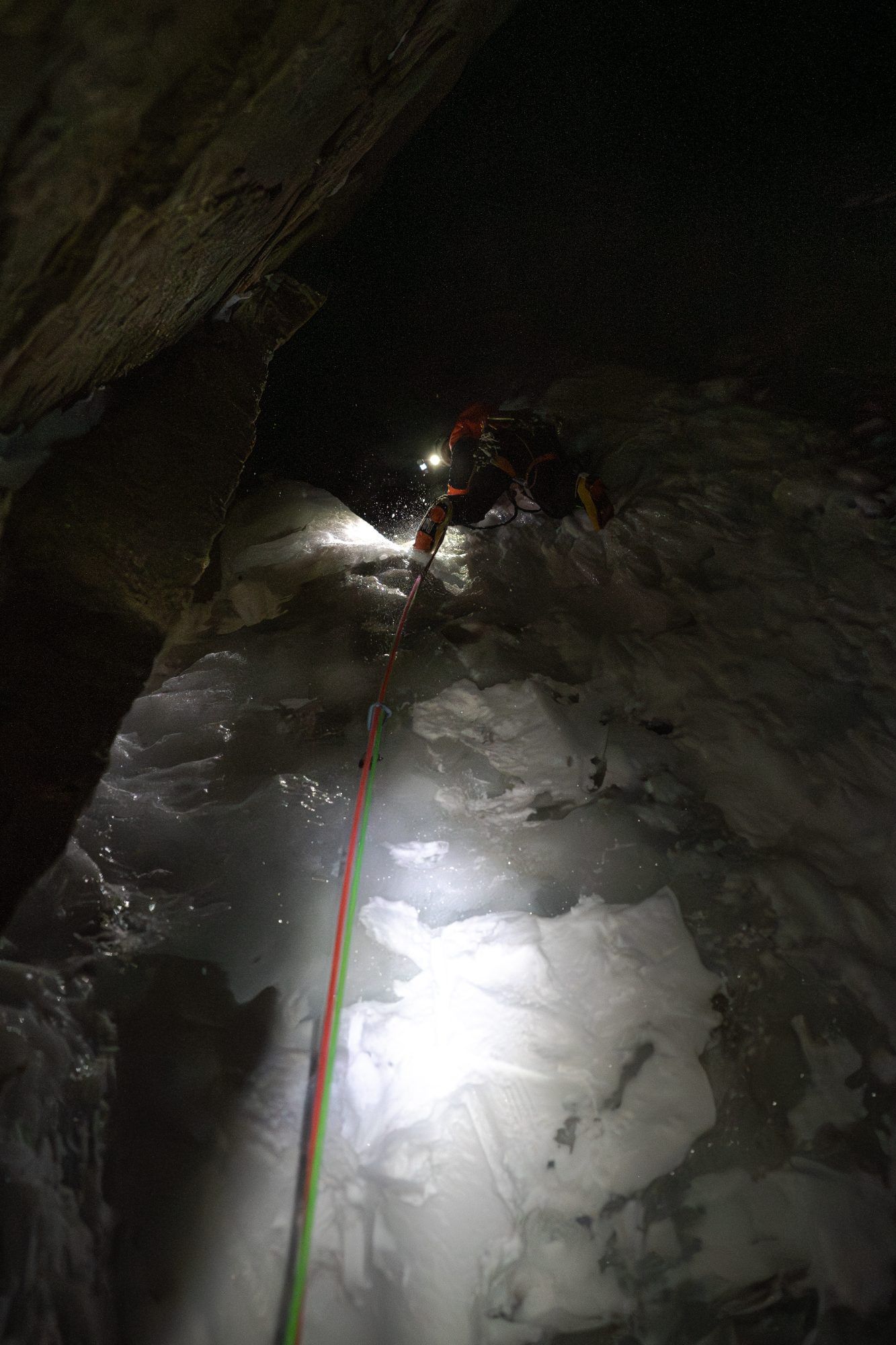 Climbing ice at night by headlamp on Tomahawk
