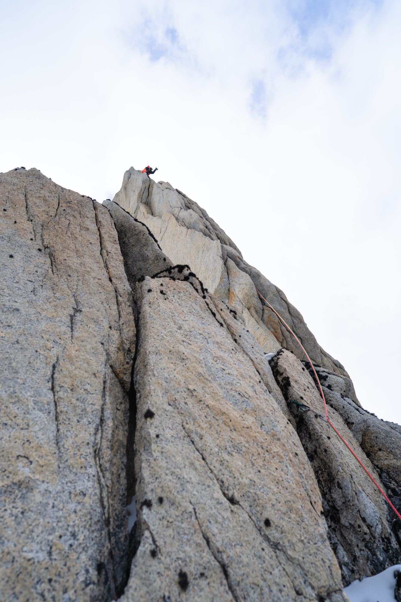 Climber on top of the Torrisimo summit tower